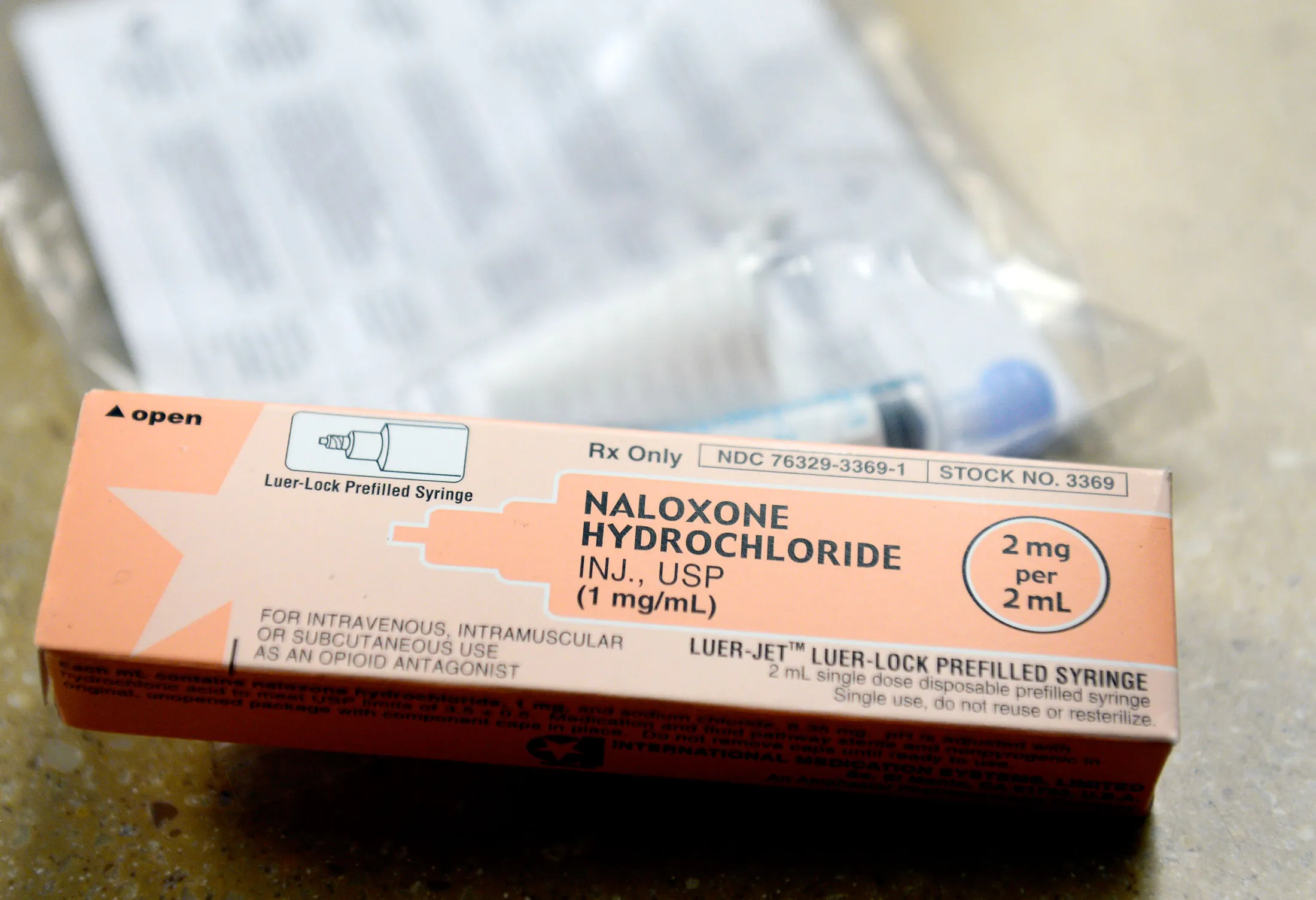 A syringe of Naloxone.
