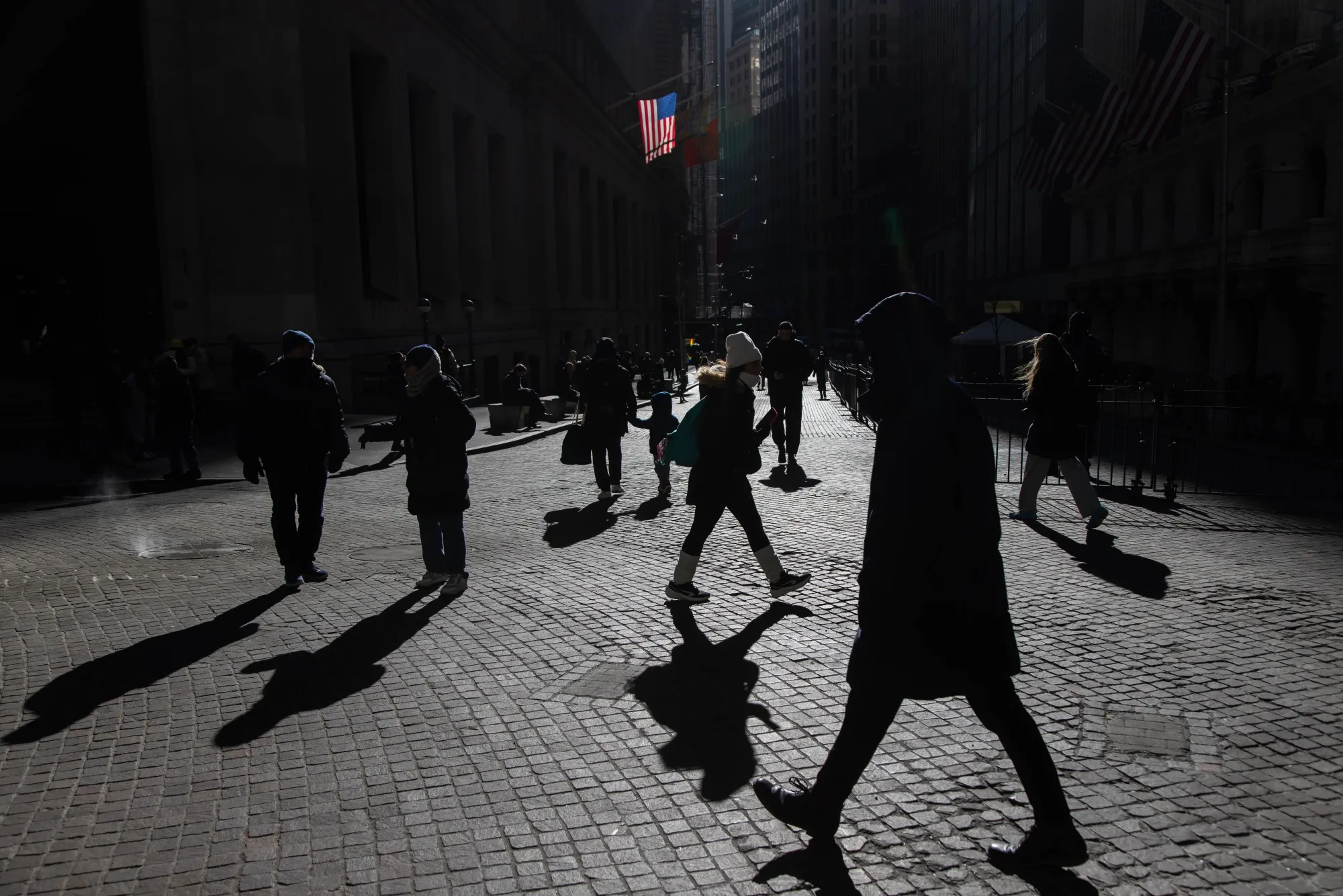 Pedestrians outside of the New York Stock Exchange.
