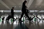 University students walk through a job fair.