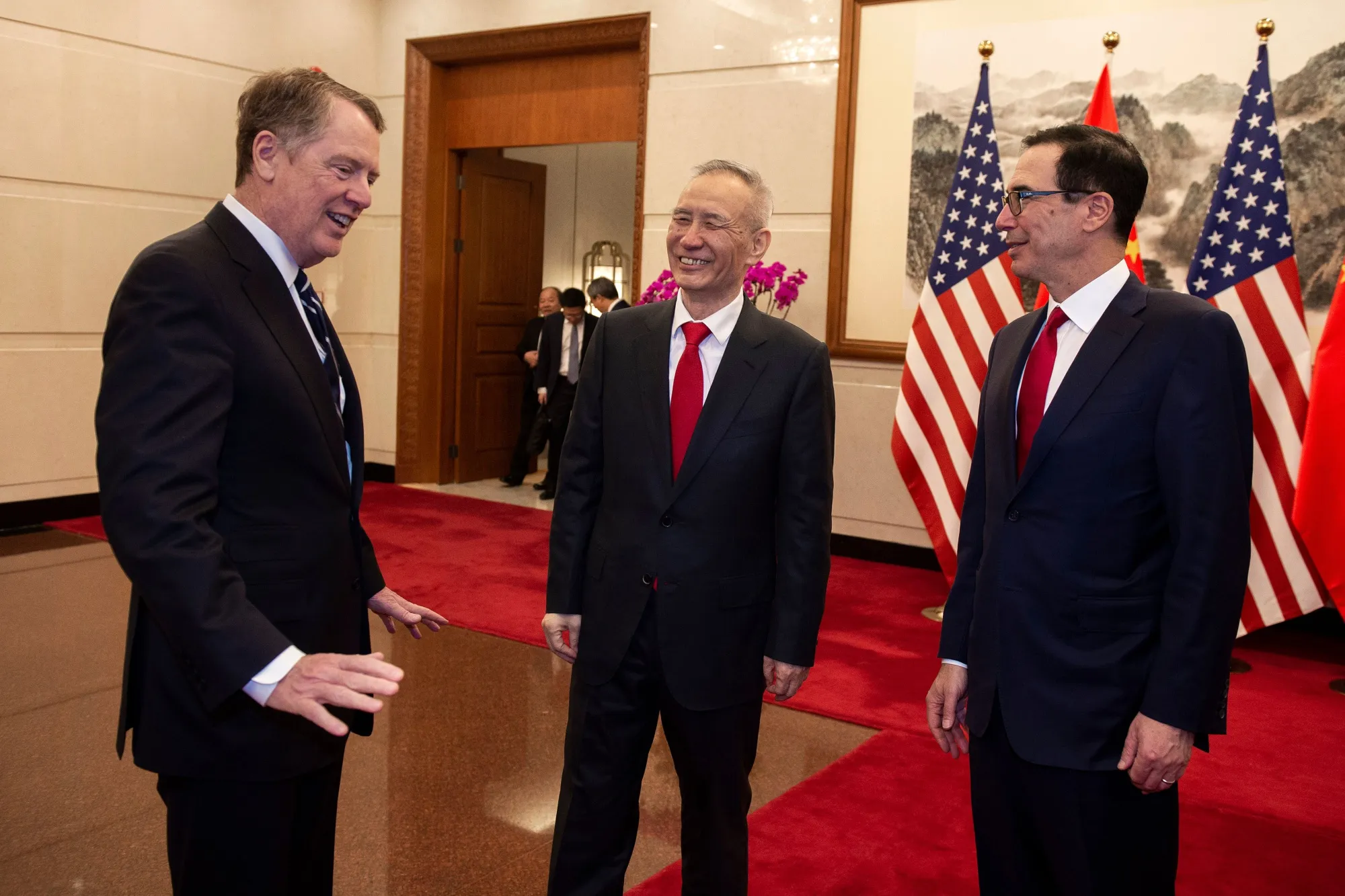Robert Lighthizer, left, Liu He, and Steven Mnuchin  on March 29.