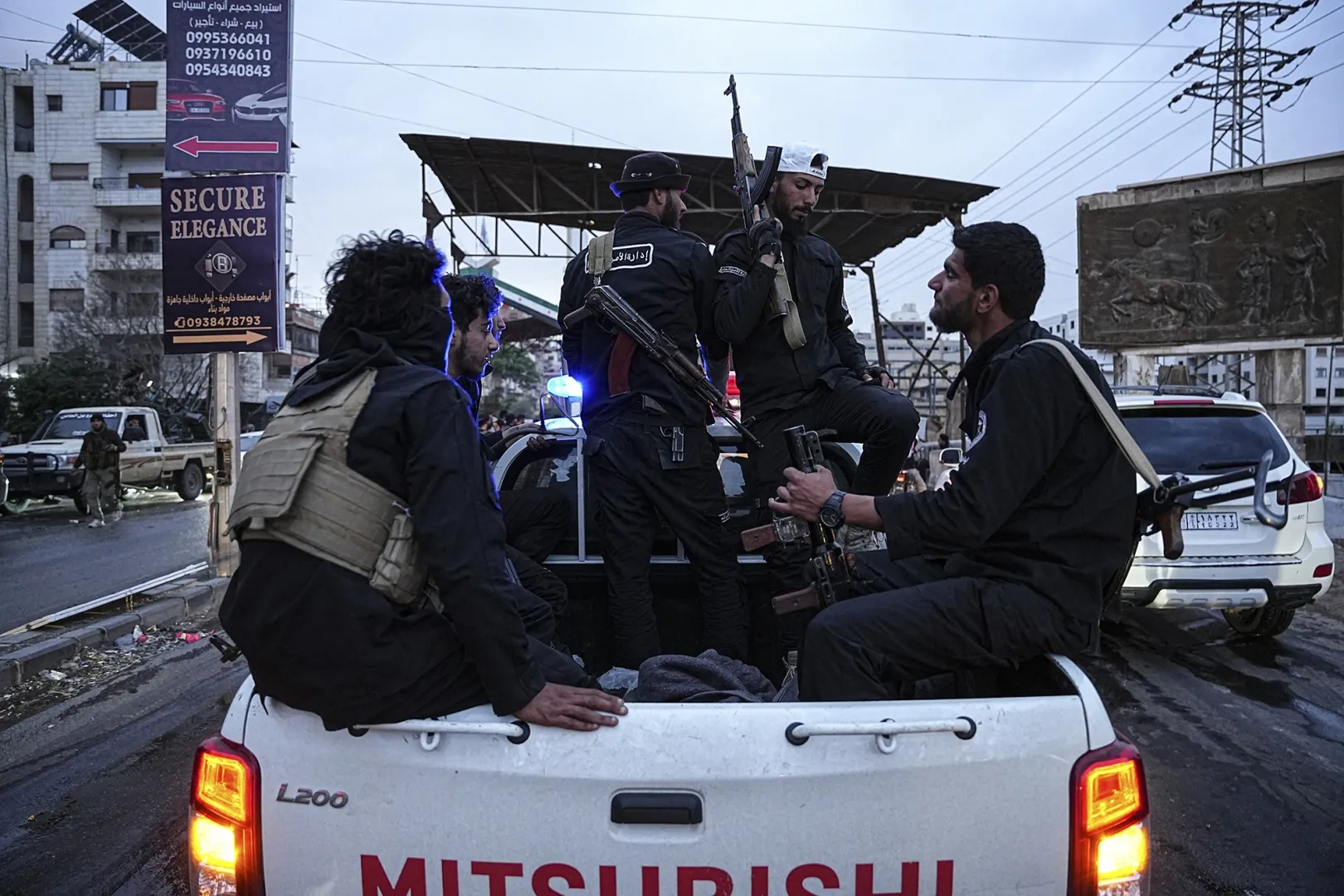 Armed Syrian government forces in Sahnaya, Syria, on April 30.