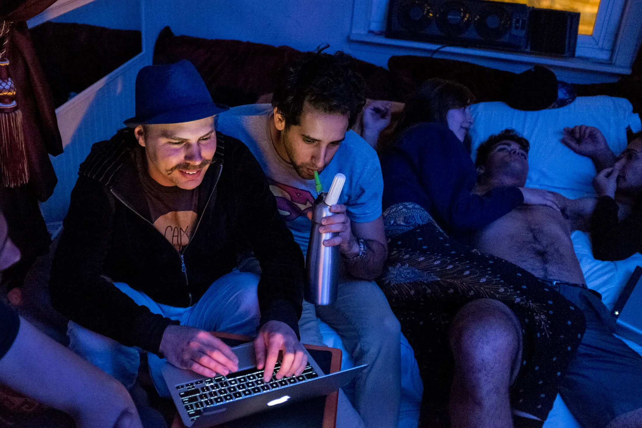 Adonis Gaitatzis, founder of hardware company Net Ninja, with Lior Neu-ner, an app ­developer, doing whip-its (nitrous oxide: Go ask Alice), while some friends get to know each other better.
