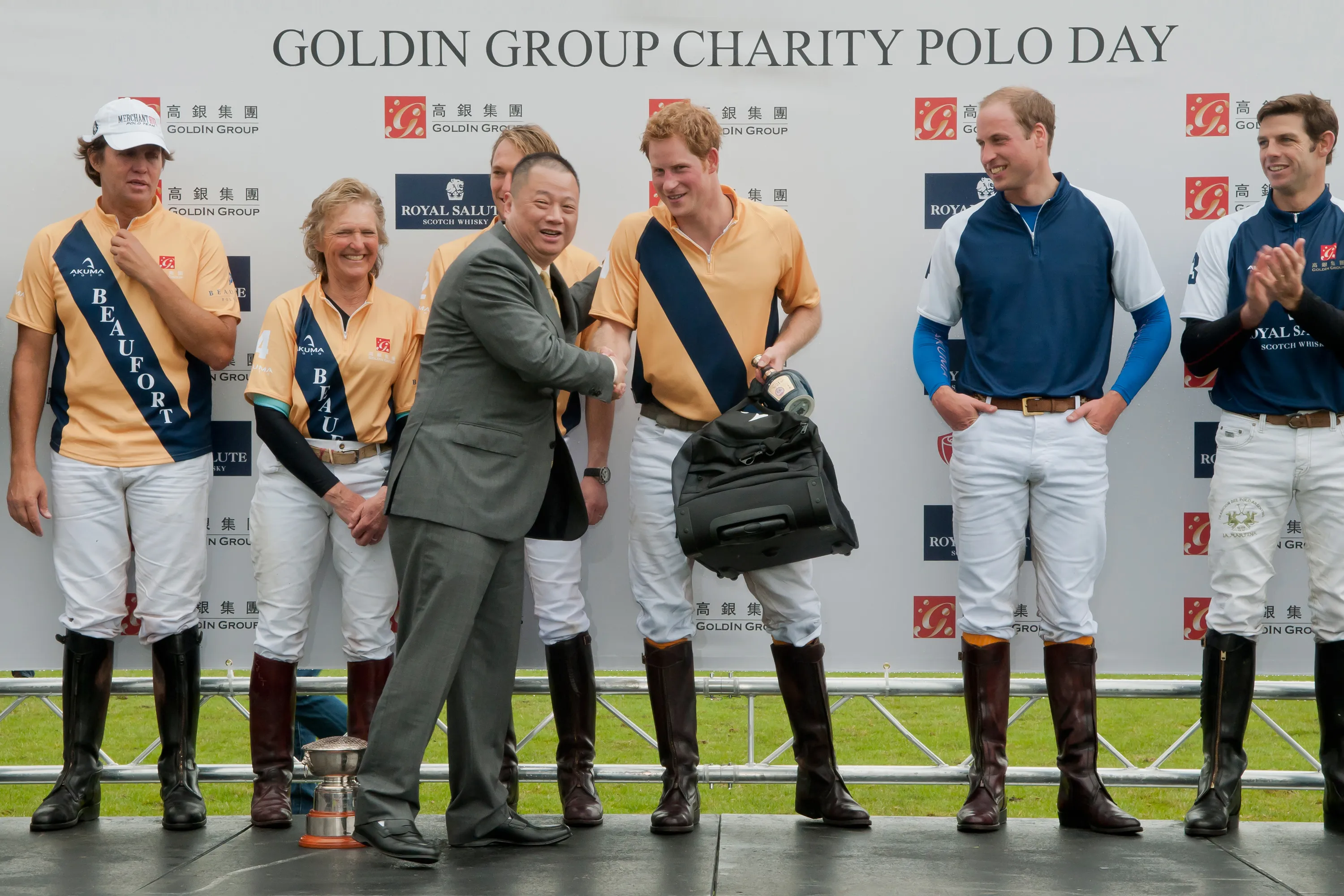 Pan Sutong with princes Harry and William. (Photo: Courtesy of Goldin Group)
