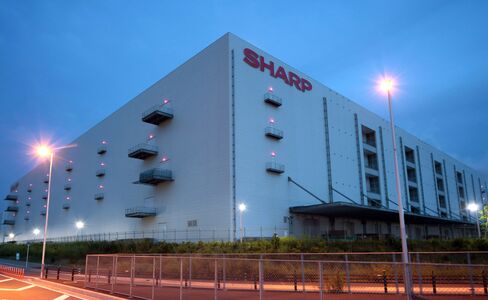Sharp Falls After Report It Offered Stake for Less