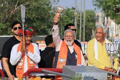 Indian Prime Minister Narendra Modi (center) with local officials at a&nbsp;Bharatiya Janata Party campaign event in&nbsp;Rajasthan on April 12.