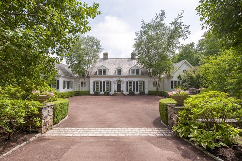 The entry to the home, which has a three-car garage.