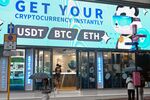 Bitcoin, ethereum and the stablecoin USDT are promoted at a cryptocurrency store in Hong Kong on July 29, 2025. Stablecoin excitement has gripped Hong Kong as the city prepares to launch a licensing system for the less volatile type of cryptocurrency, but authorities warn against overplaying its future role in financial systems. (Photo by Peter PARKS / AFP) / To go with AFP story Hong Kong-China-cryptocurrency-banking-tech, FOCUS by Holmes Chan, with Katie Forster in Tokyo (Photo by PETER PARKS/AFP via Getty Images)