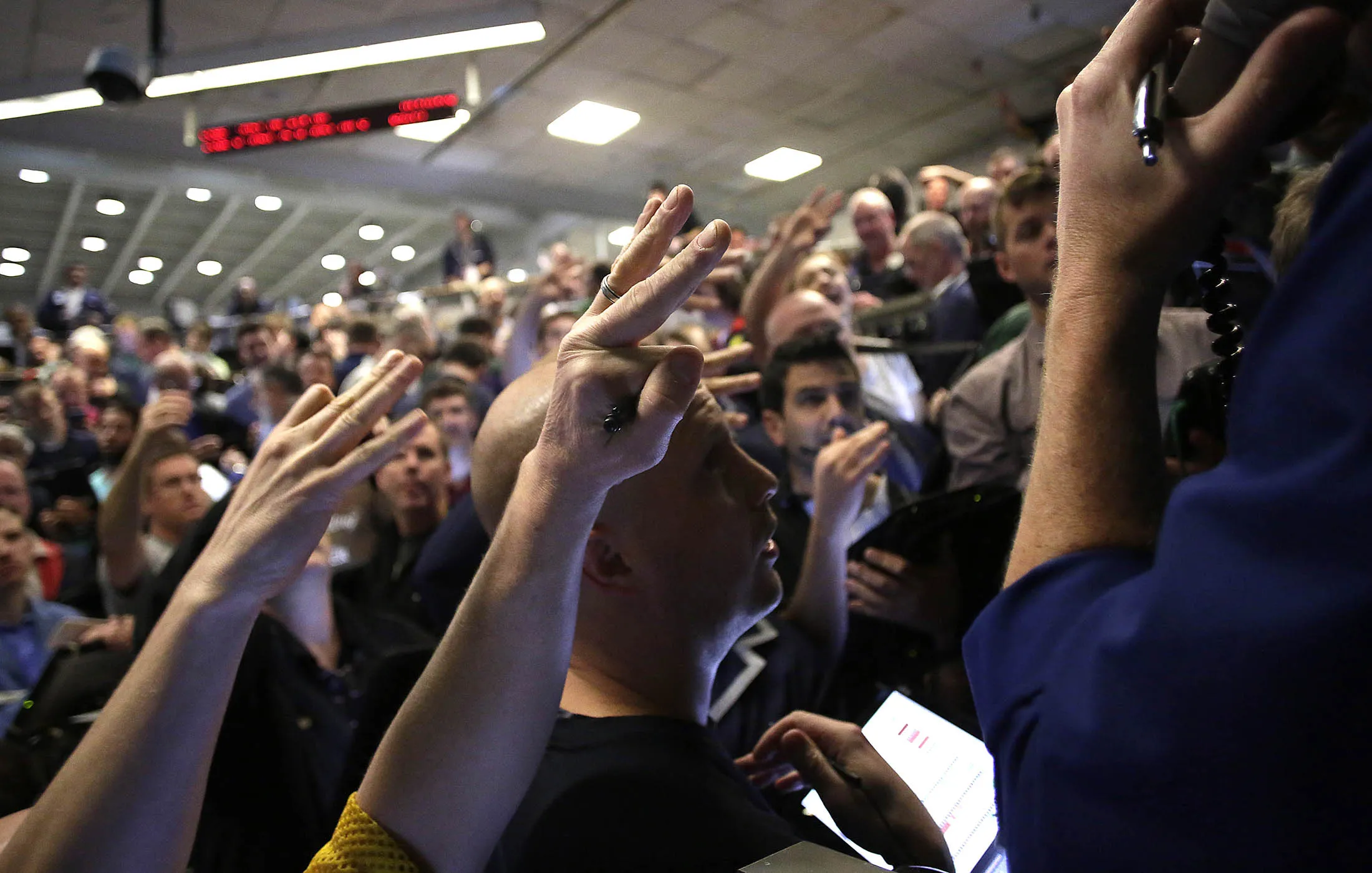 CHICAGO, IL - DECEMBER 16 : Traders in the Standard &amp; Poor's 500 stock index options pit at the Chicago Board Options Exchange (CBOE) react to the Federal Reserves interest rate hike December 16, 2015 in Chicago, Illinois. The Federal Reserves raised the interest rates for the first time since 2006 by 0.25 percentage points.
