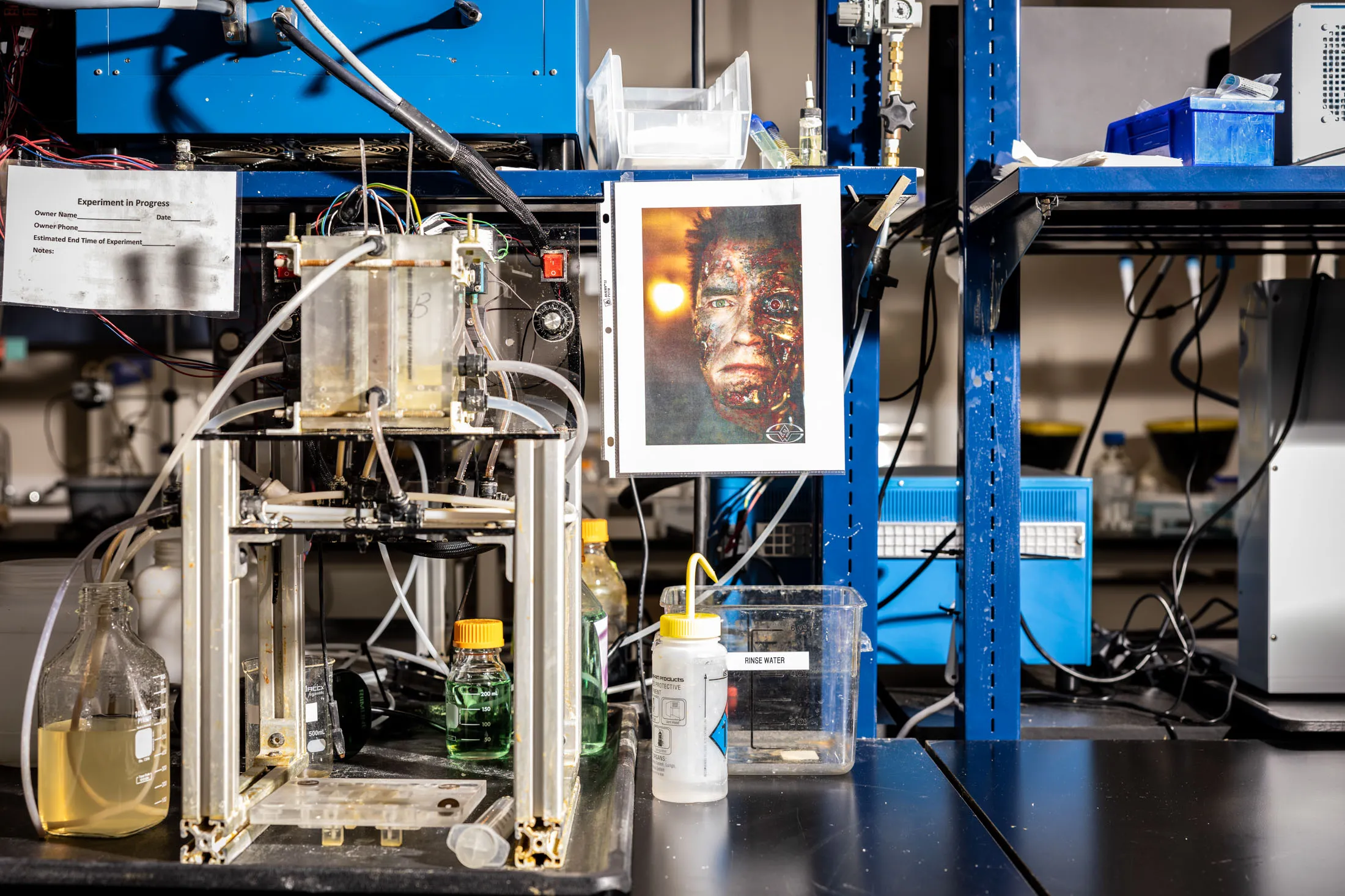 A testing rig in the&nbsp;lab at Electra in Boulder, Colorado, on Sept. 9, 2022. The rig has a photo of Arnold Schwarzenegger next to it and is nicknamed Arnold, “because it pumps iron,”&nbsp;according to Colleen Wallace, senior scientist at Electra.