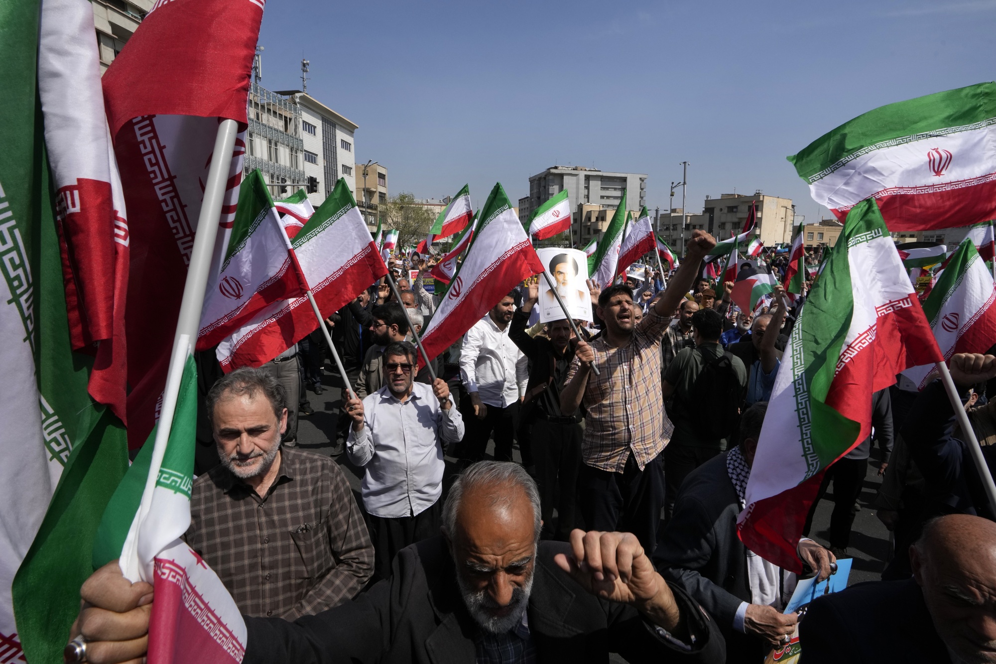 Worshippers chant slogans during an anti-Israeli gathering after Friday prayers in Tehran, Iran, on April 19.