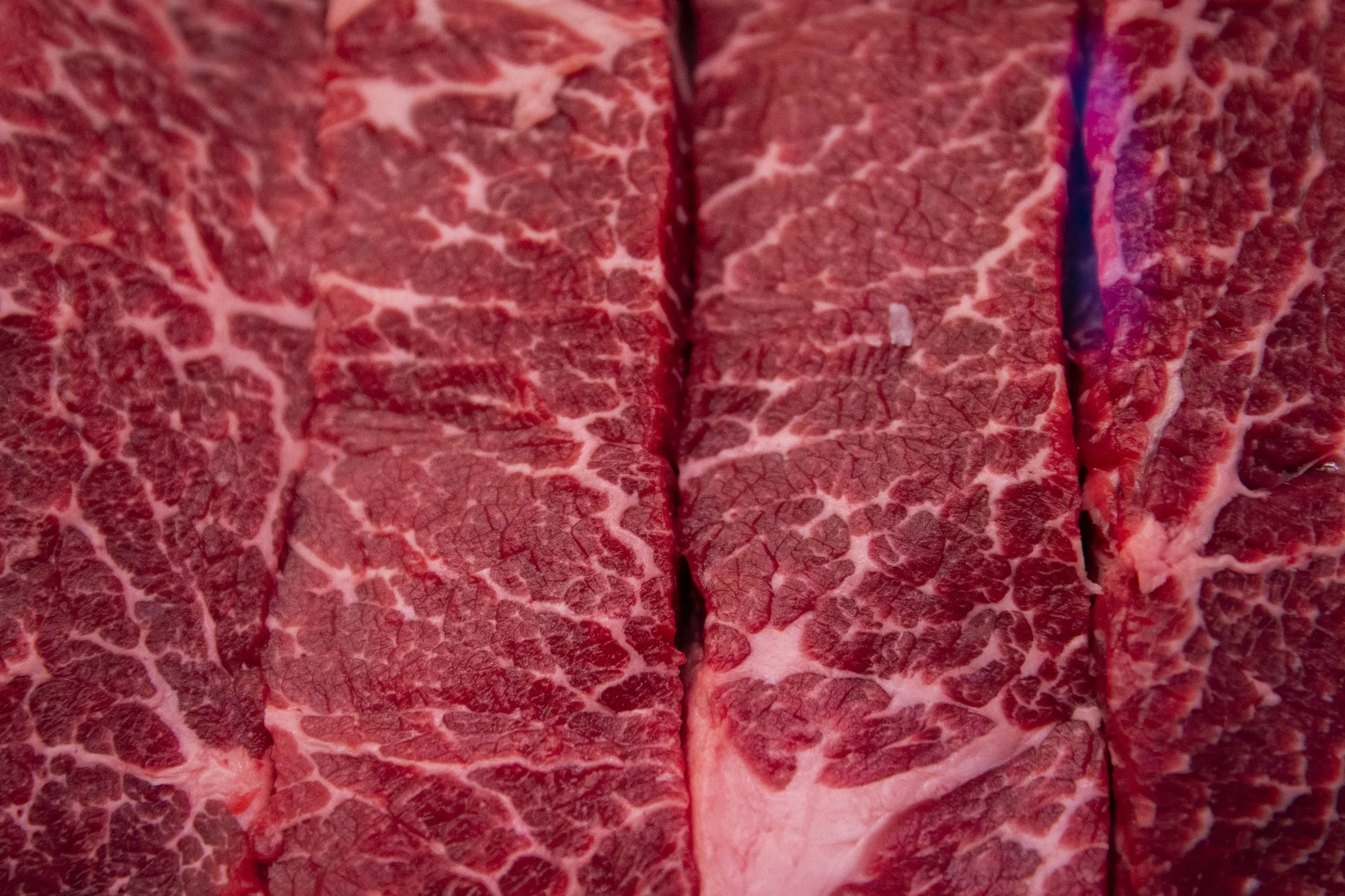 Cuts of bone-in short rib for sale at a butcher shop in the Union Market district in Washington.