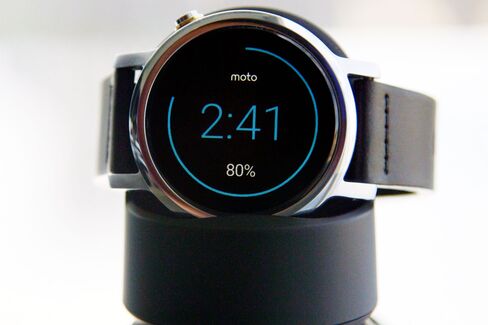 The Moto 360 becomes an alarm clock when it's charging on the included magnetic cradle.