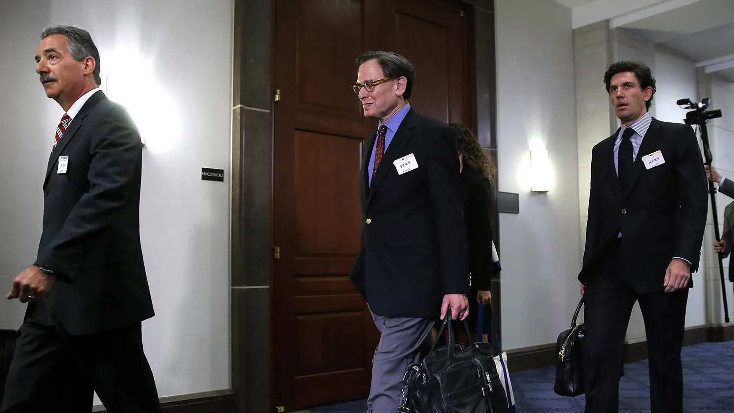Sidney Blumenthal (C), a longtime advisor to former President Bill Clinton and former Secretary of State Hillary Clinton, arrives to be deposed by the House Select Committee on Benghazi with former Deputy Attorney General Jim Cole (L) in the House Visitors Center at the U.S. Capitol June 16, 2015 in Washington, DC.
