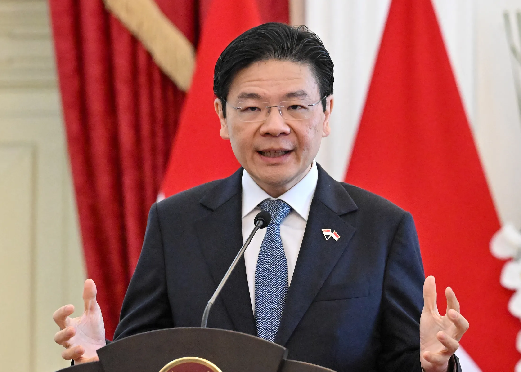 Deepfakes of Singapore PM Used to Sell Crypto, Residency Program - Bloomberg