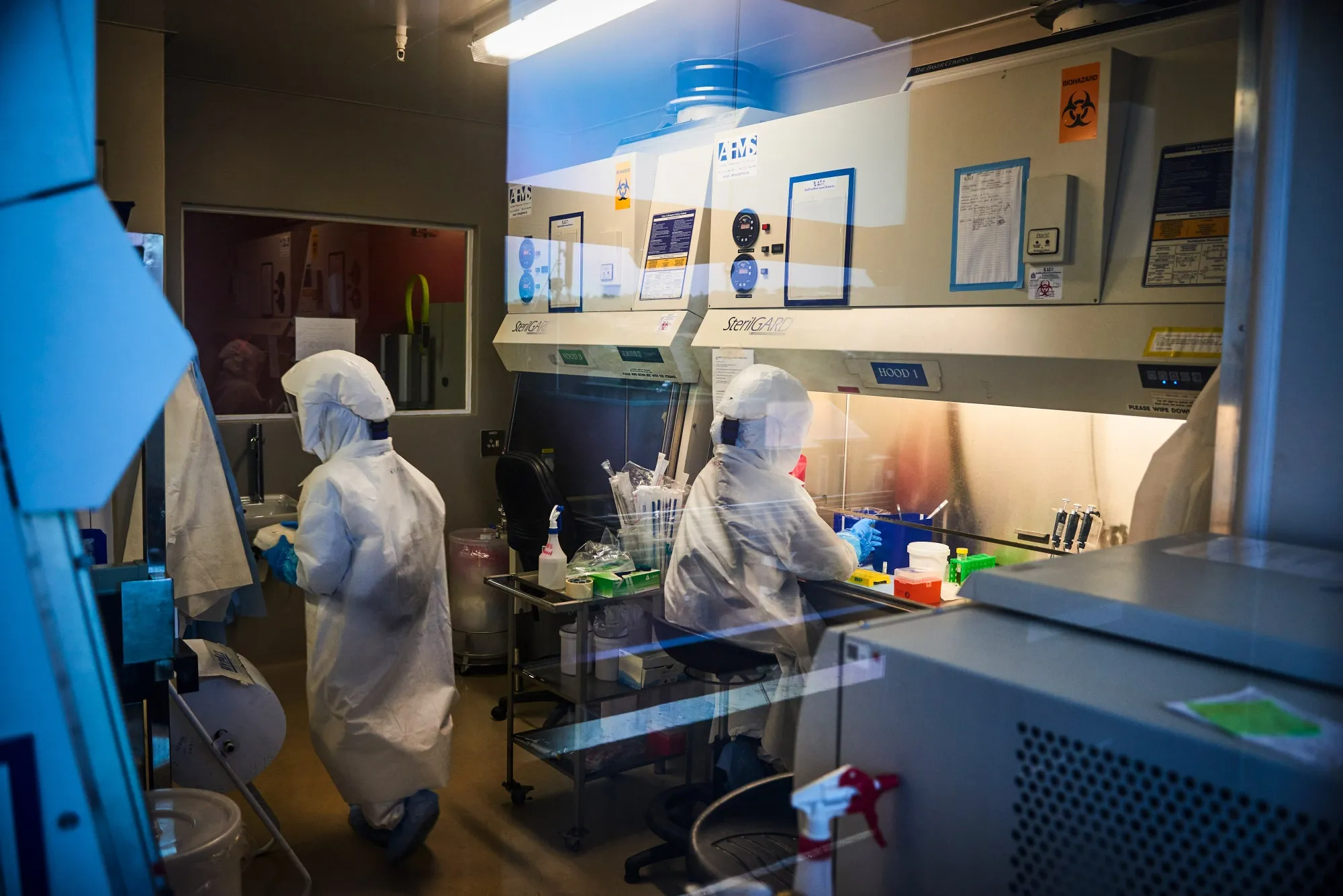 Technicians work inside a biosafety level 3 Covid-19 research laboratory at the Africa Health Research Institute in Durban, South Africa.
