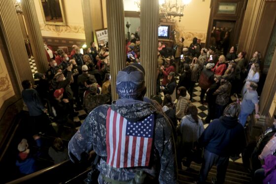 Michigan Cancels Legislative Session to Avoid Armed Protesters