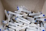 Syringes during an H1N1 vaccination clinic at St. Barnabas Presbyterian Church in Dallas in 2009.&#13;
