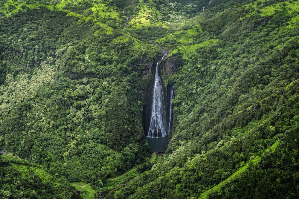 Aerial of Manawaiopuna Falls, more famously known as the Jurassic Falls because it was featured in the movie