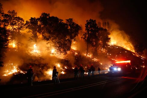 The Valley Fire, which started on Sept. 12, burned wineries to the ground. Here, firefighters combat a backfire on Sept. 13, 2015.