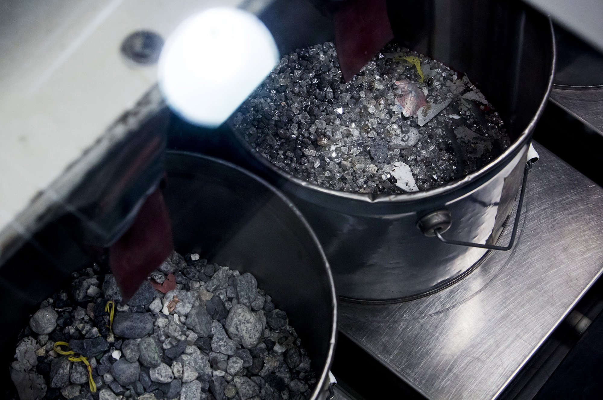 Diamonds are collected in buckets at the end stage of processing at the Diavik Diamond Mine facility, owned by Rio Tinto Plc and Dominion Diamond Corp., in the North Slave Region of the Northwest Territories, Canada.
