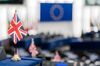 A U.K. national flag, also known as a Union Jack, sits on the empty desk of a Member of European Parliament (MEP) inside the European Parliament in Strasbourg, France, on Tuesday, July 16, 2019. Ursula von der Leyen of Germany made a final pitch to become European Commission president, telling lawmakers at the EU Parliament she would pursue policies to protect the climate and improve social justice.