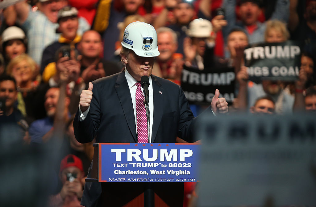 Donald Trump models a hard hat in support of the miners during a campaign rally in Charleston, West Virginia&nbsp;on May 5, 2016.