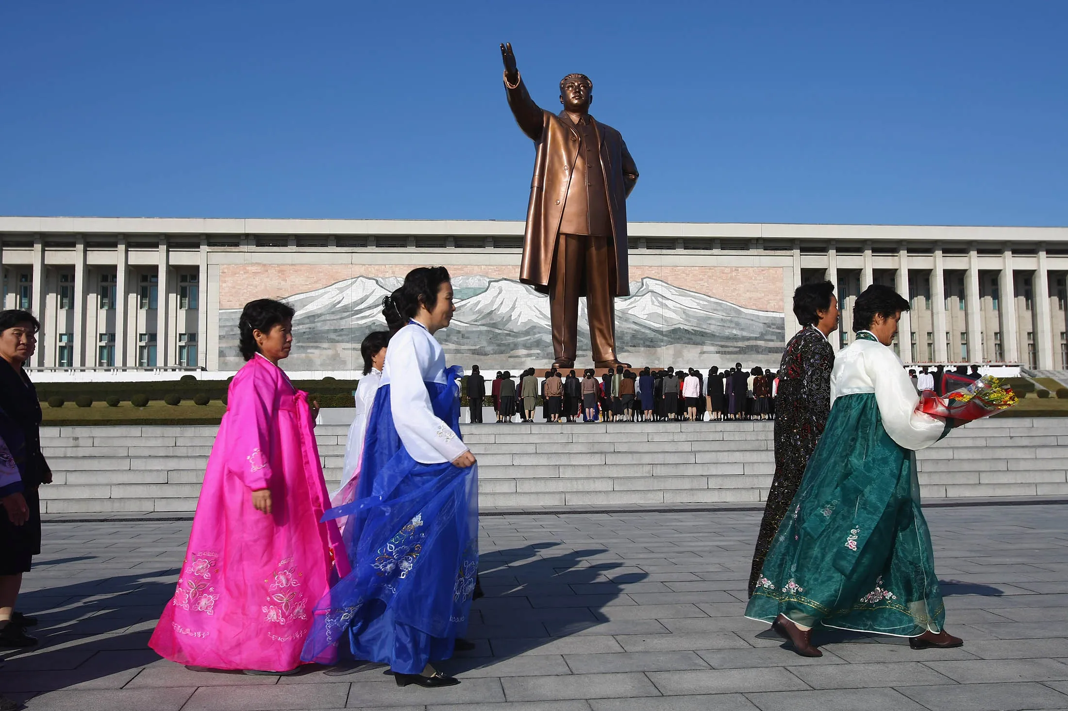 The bronze statue of Kim Il Sung stands on Mansu Hill in Pyongyang.
