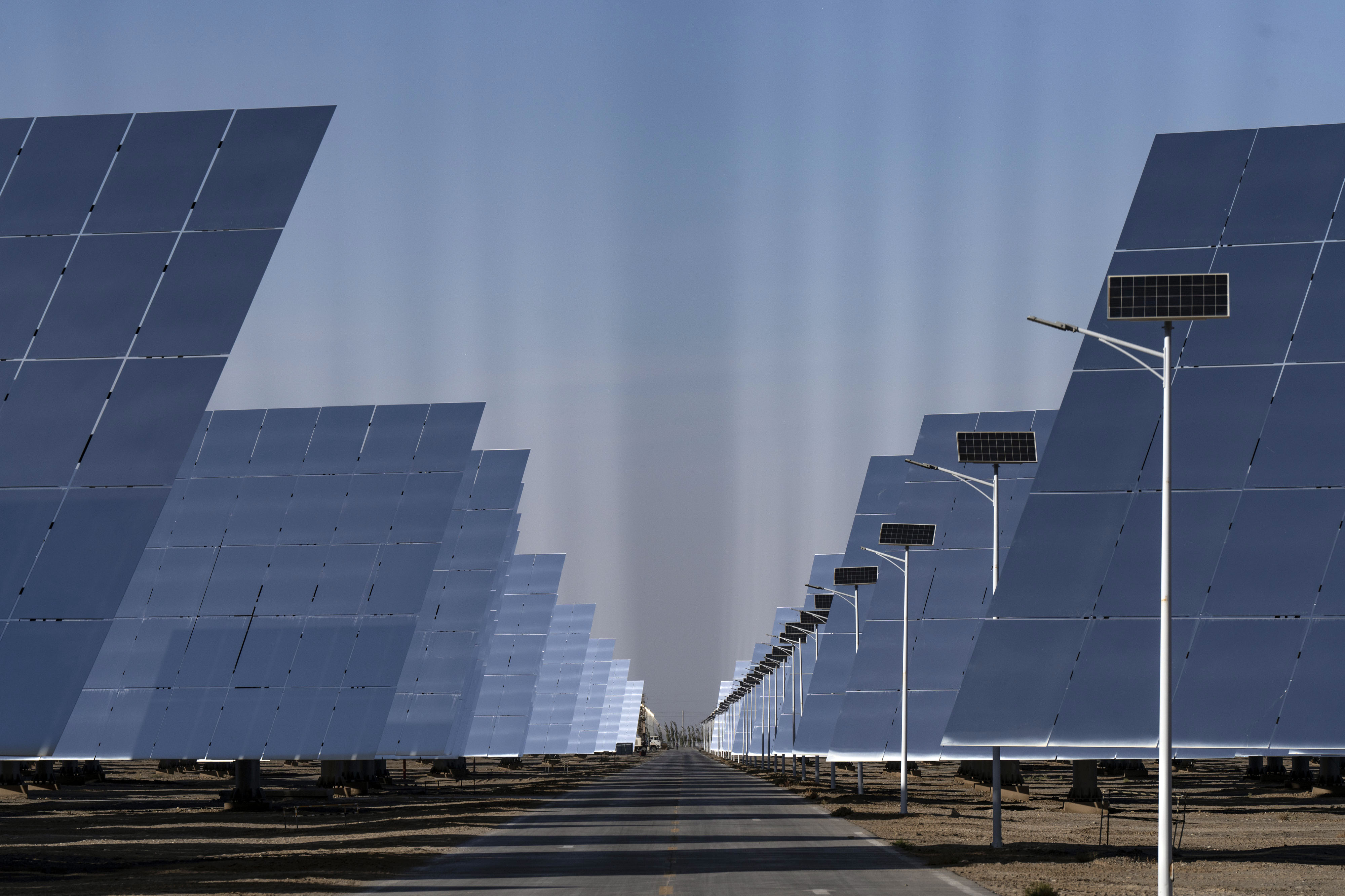 Solar panels at a photovoltaic power station in Gansu Province, China. Photographer: Qilai Shen/Bloomberg