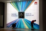An illuminated billboard displays Huawei Technologies Co. Kirin 990 flagship 5G integrated circuit as the company's exhibition stand is prepared during a press preview day at the IFA consumer electronics show in Berlin,&nbsp; on Sept. 5, 2019.&nbsp;