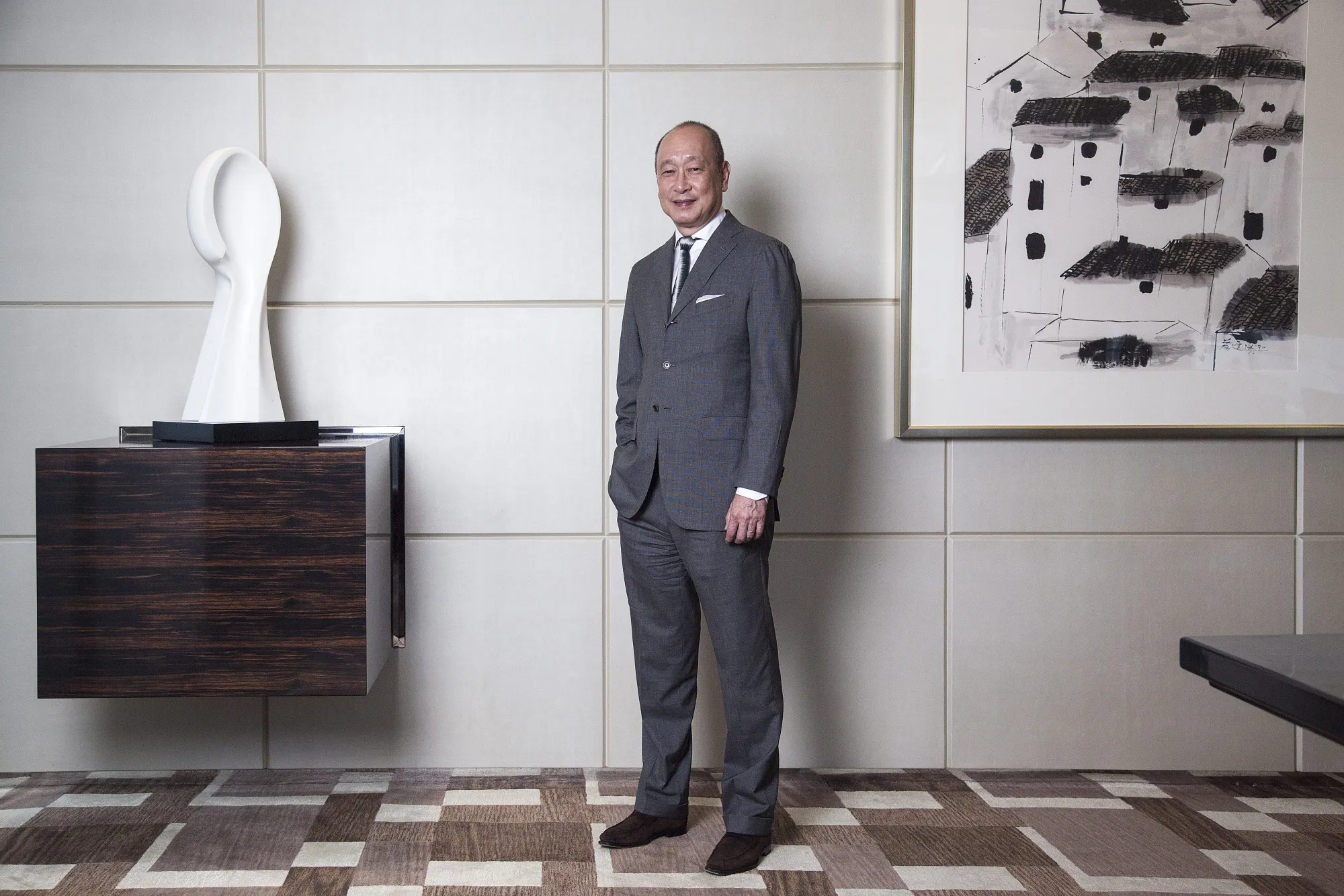 Wee Ee Cheong with two of the UOB’s art collection.