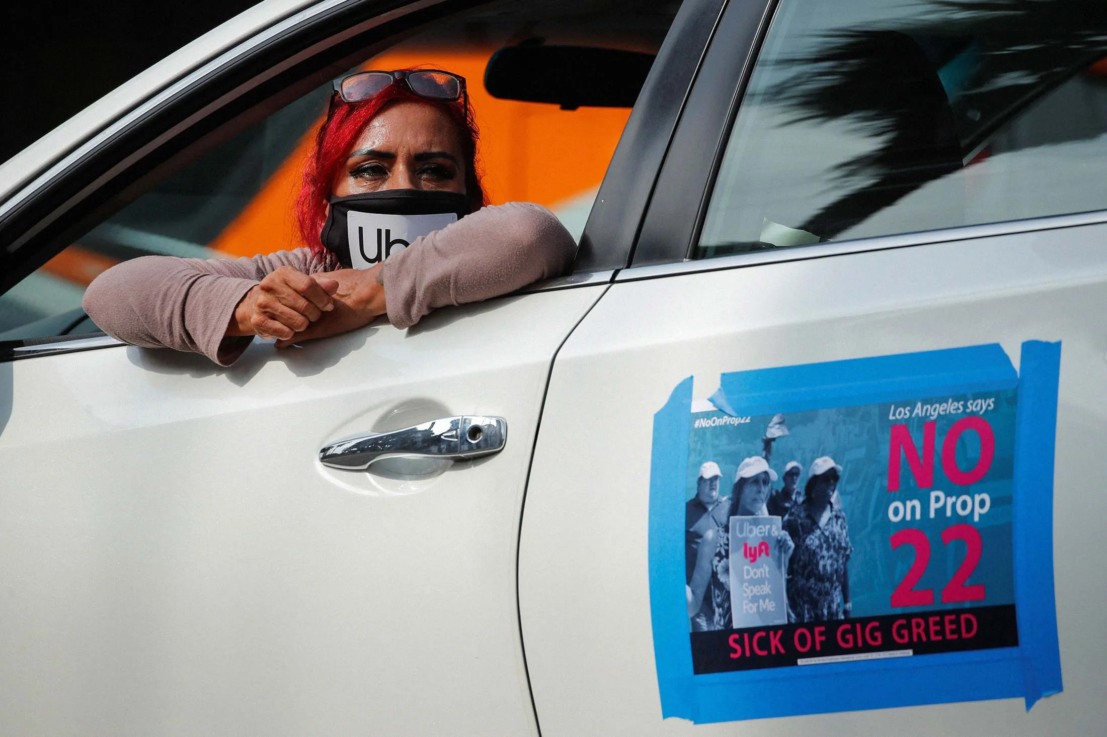 An app-based gig worker at an Oct. 8 demonstration outside Los Angeles City Hall.