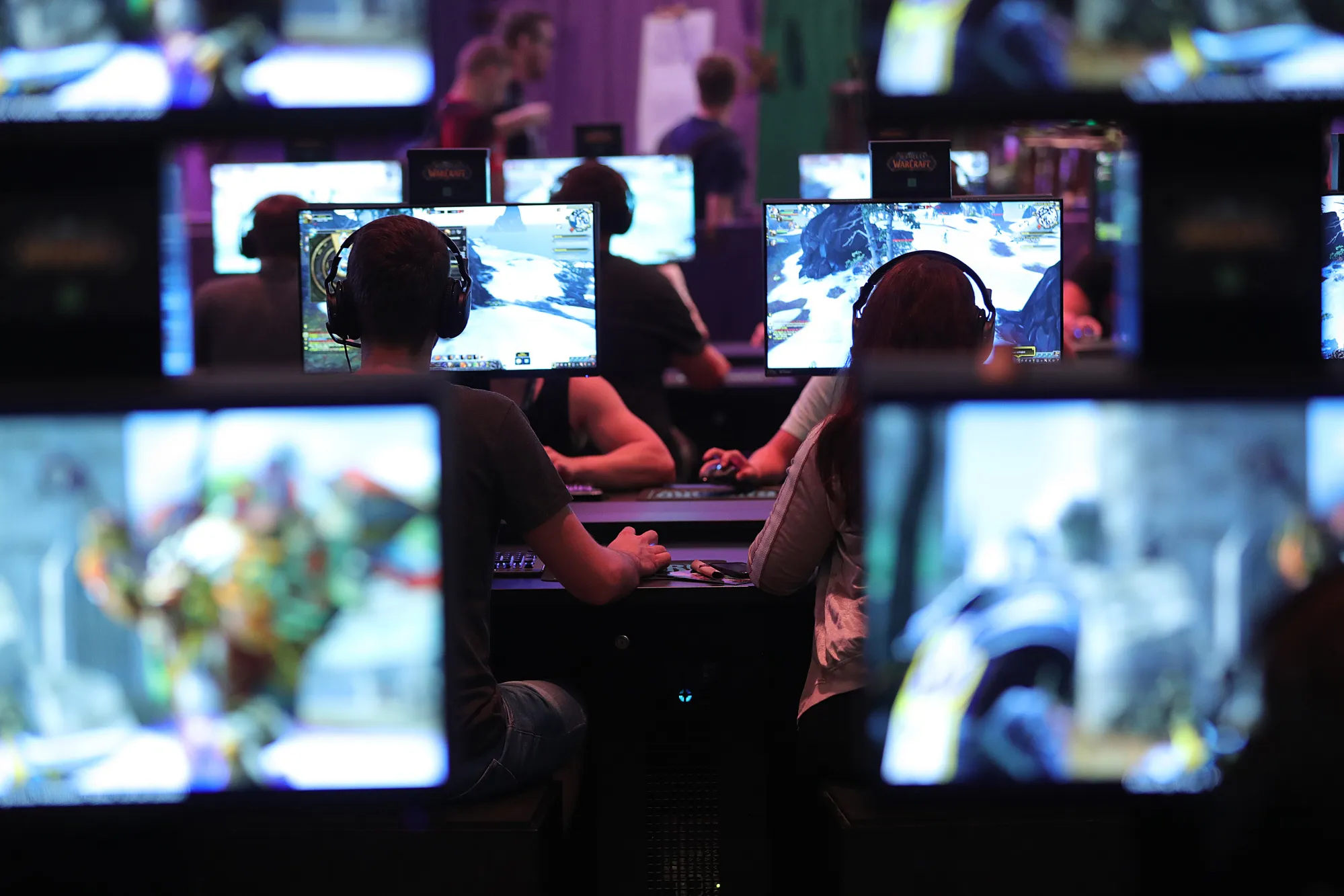 Gamers play the 'World of Warcraft' computer game at the Gamescom gaming industry event in Cologne, German.