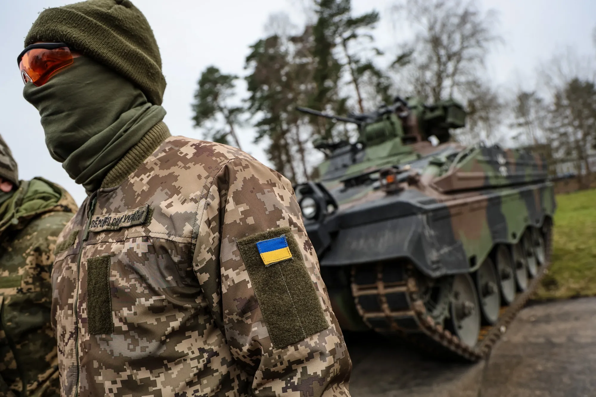 Ukrainian soldier, Western tank, ready to go.