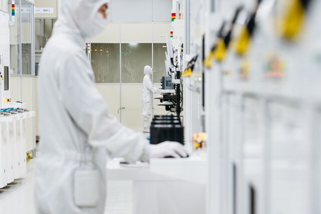Workers at a semiconductor fabrication site in South Korea, in February 2024.