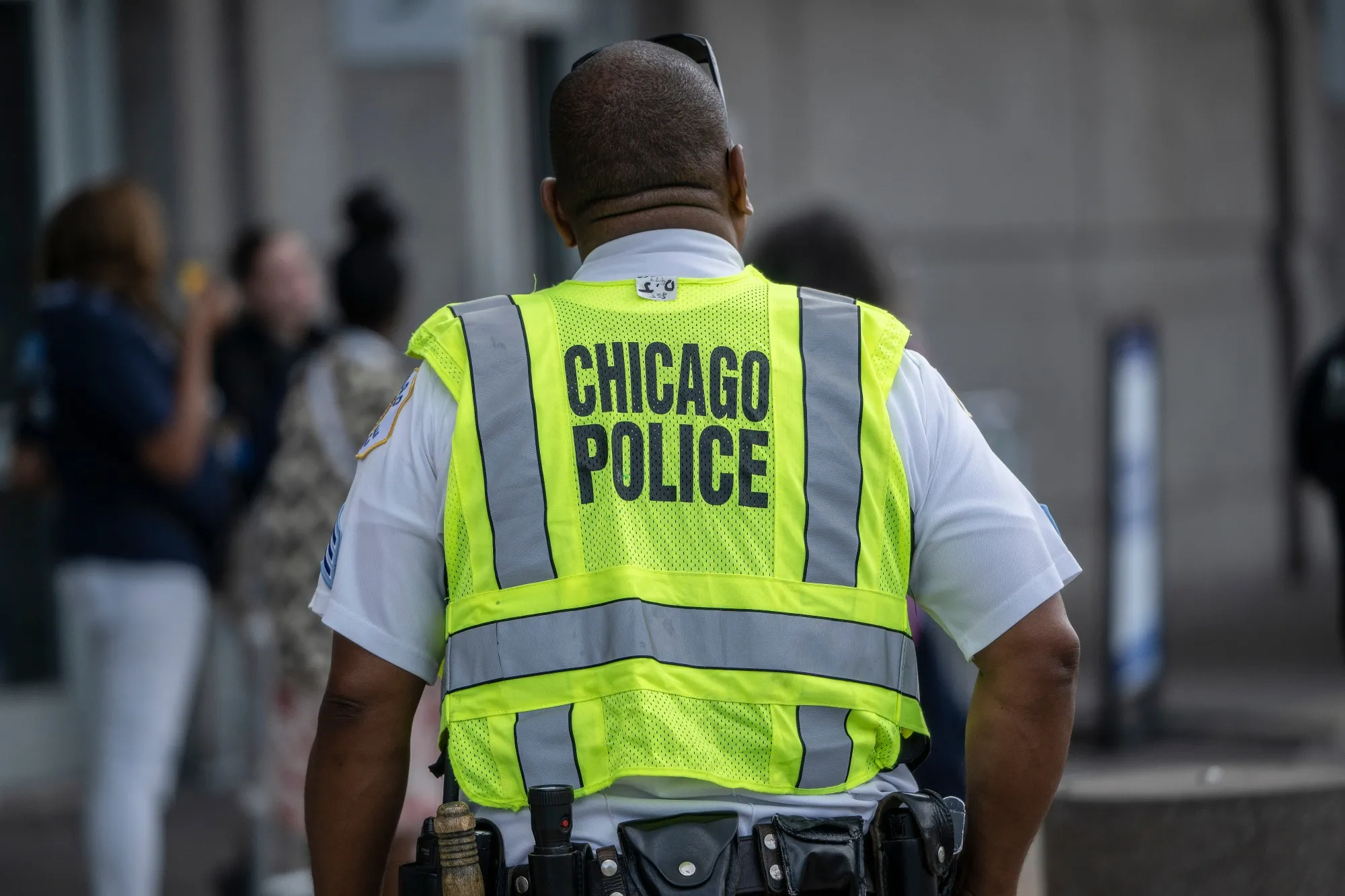 A Chicago police officer outside the United Center ahead of the Democratic National Convention&nbsp;in August, 2024.&nbsp;