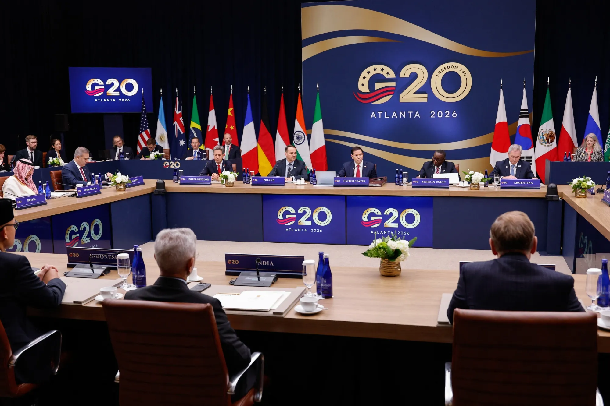 Marco Rubio, center, speaks during the first plenary session of the G20 foreign ministers' meeting in Atlanta