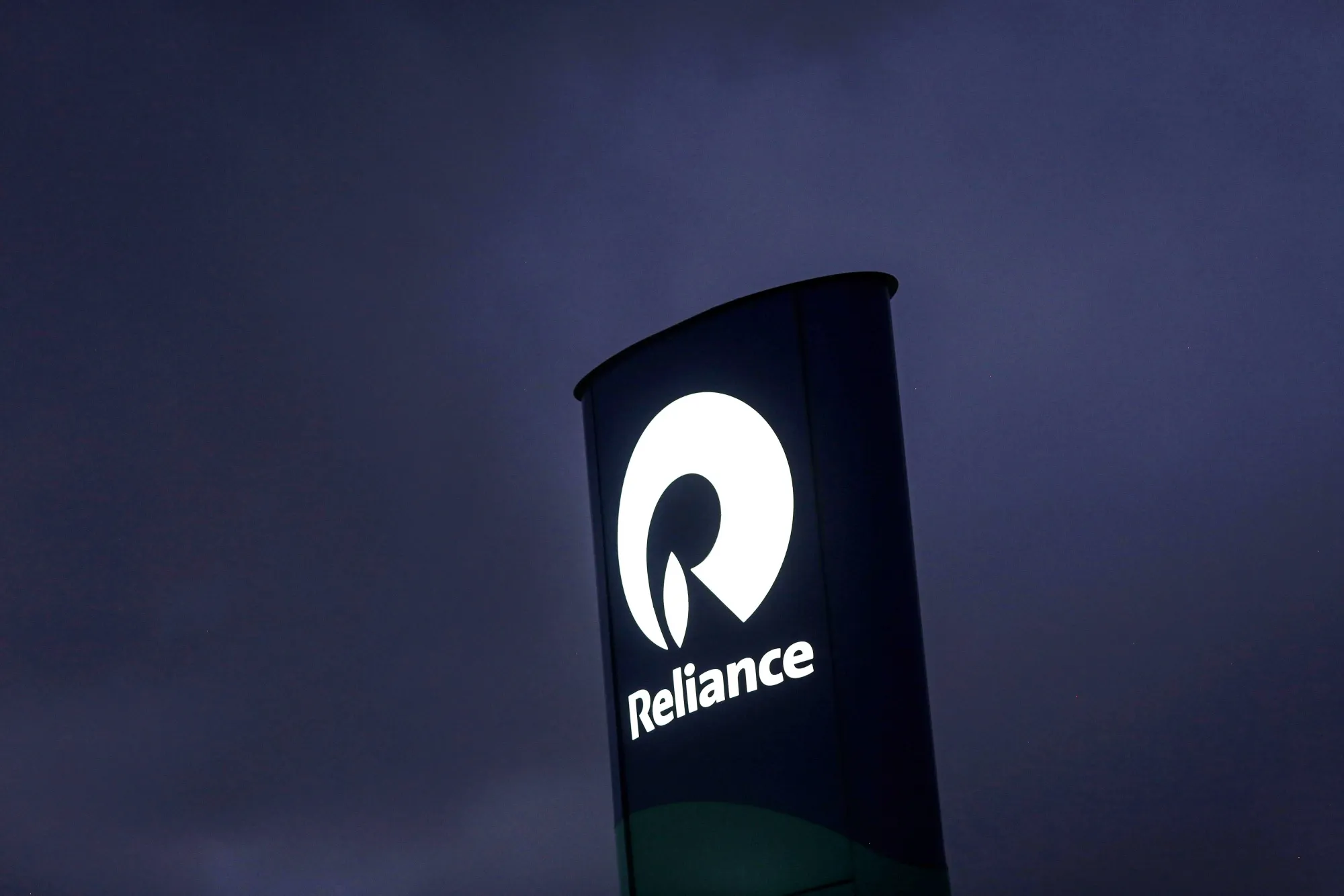 A Reliance Industries Ltd. sign.
