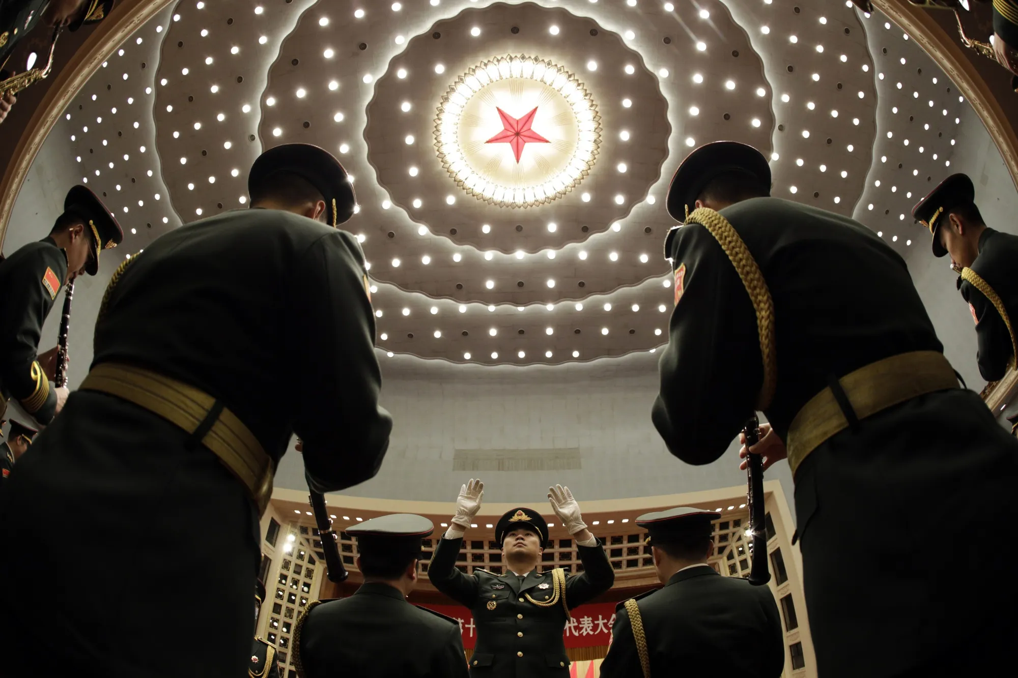 Members of the Chinese People's Liberation Army (PLA) band perform.