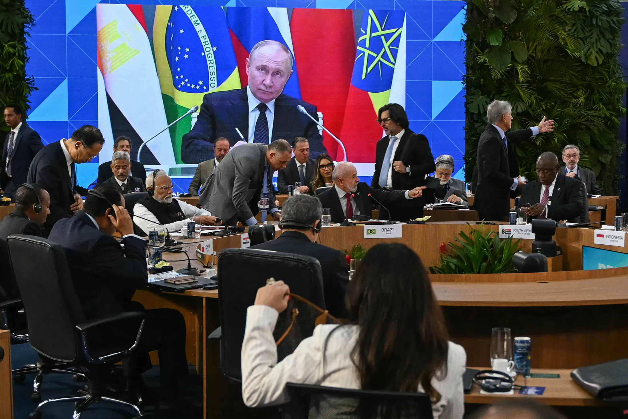 Russian President Vladimir Putin on a screen during the first plenary session of the BRICS summit in Rio de Janeiro, Brazil, on July 6.