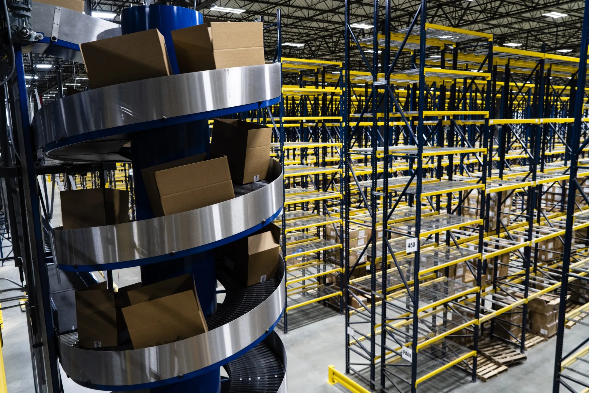 Boxes of shoes move along a conveyor belt at the Genesco Journeys distribution center in Lebanon, Tennessee.