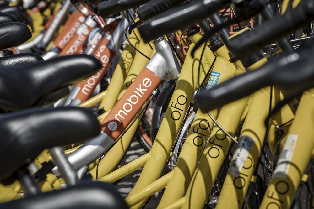 中国の美団がシェア自転車モバイク買収、3600億円と評価 - Bloomberg