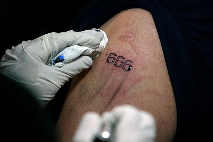 HONDURAS-RELIGION-TATTOOS