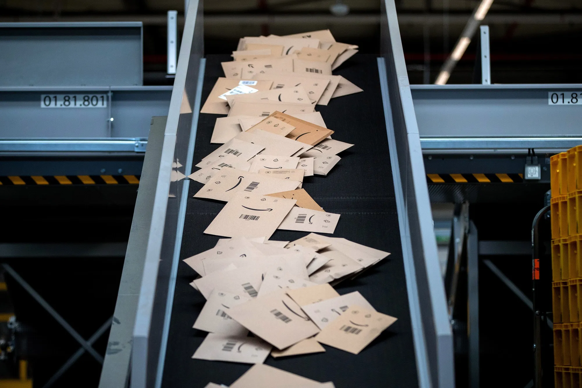 Amazon Prime packets in a Deutsche Post AG sorting office in Berlin, Germany.