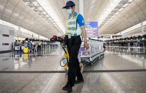 Travelers At Hong Kong International Airport