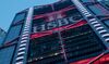 The logo for HSBC Holdings Plc is displayed on the bank's headquarters building in Hong Kong.