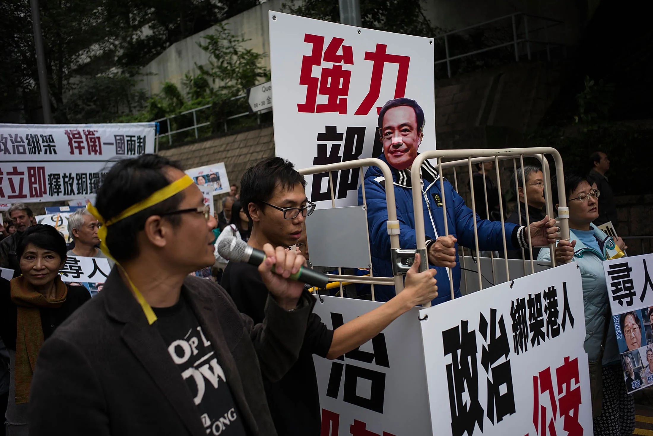 People take part of the rally to protest the disappearance of five Hong Kong booksellers on Jan. 10. Lee Bo, a British citizen, was reported missing in December and the Hong Kong immigration service has no record of him leaving the city, fanning suspicion he was sequestered by mainland authorities
