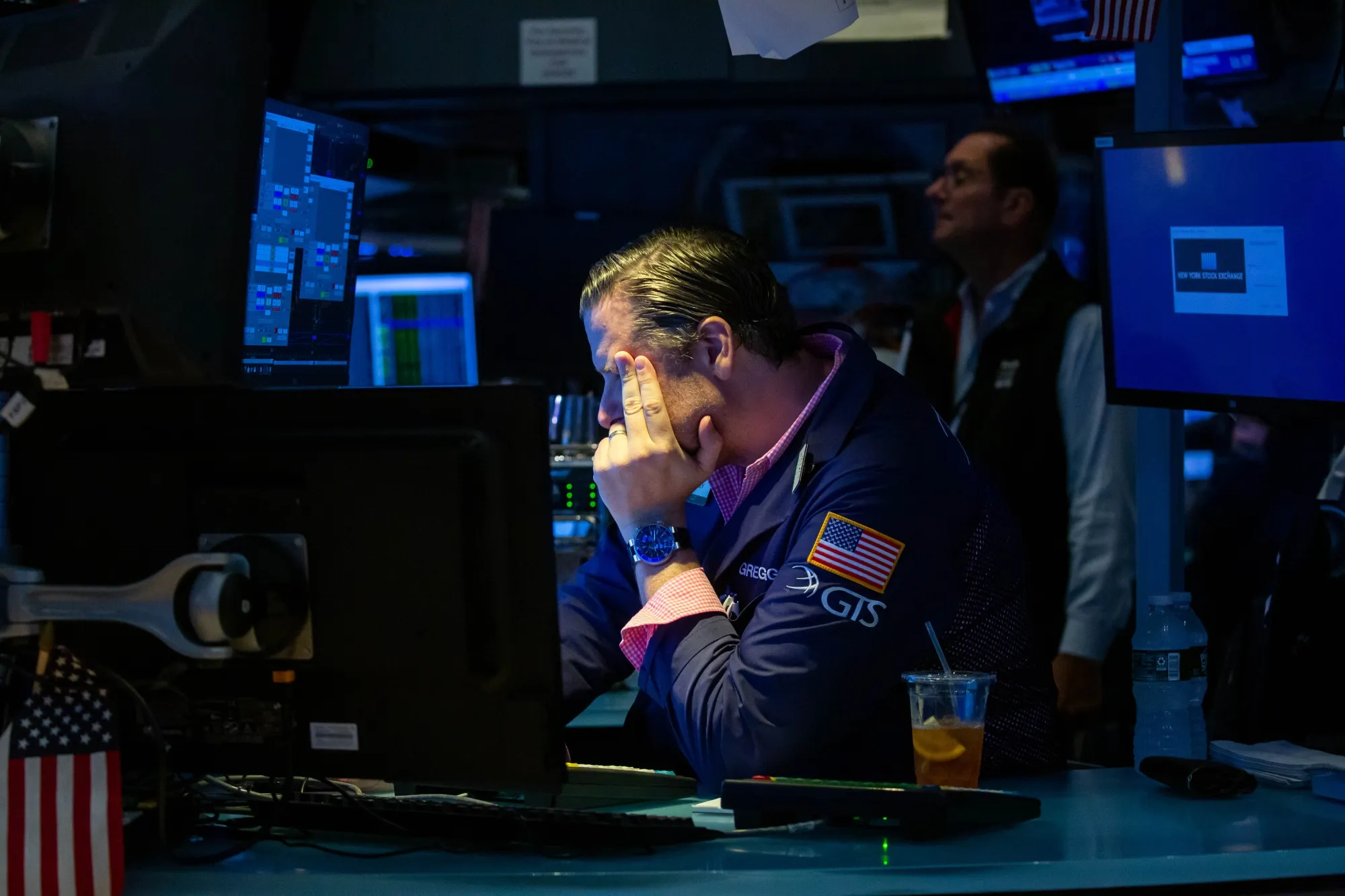 A trader works on the floor of the New York Stock Exchange (NYSE) in New York.