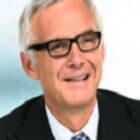 Headshot of Urs Rohner