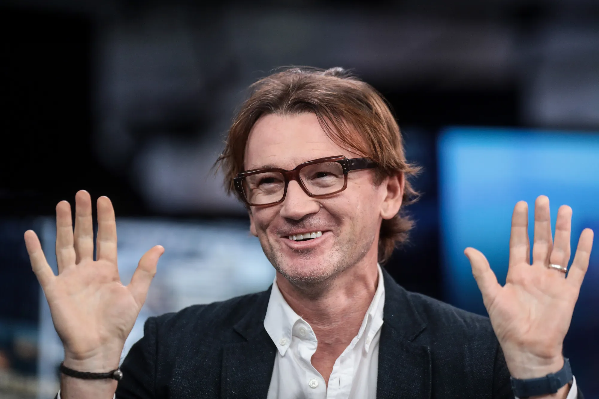 Hugh Hendry, founder of Eclectica Asset Management LLP, gestures while speaking during a Bloomberg Television interview.