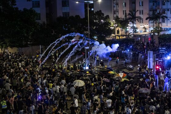 Police Fire Tear Gas to Protect China Office: Hong Kong Update